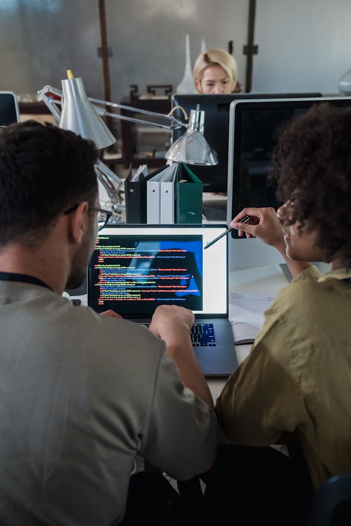 Consulting Data Pulse Tech cybersecurity team collaborating on innovative software solutions and cyber defense strategies
